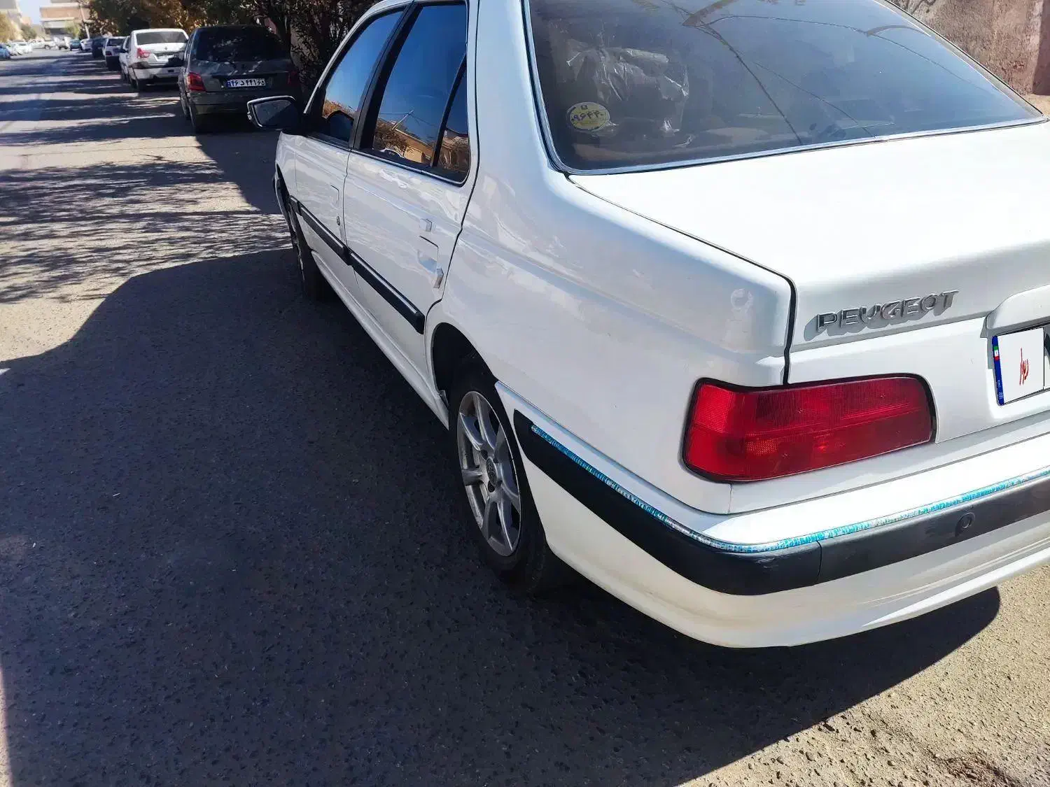 پژو پارس مدل ۱۴۰۲ سفید موتور سفارشی xup7|خودرو سواری و وانت|سیرجان, |دیوار