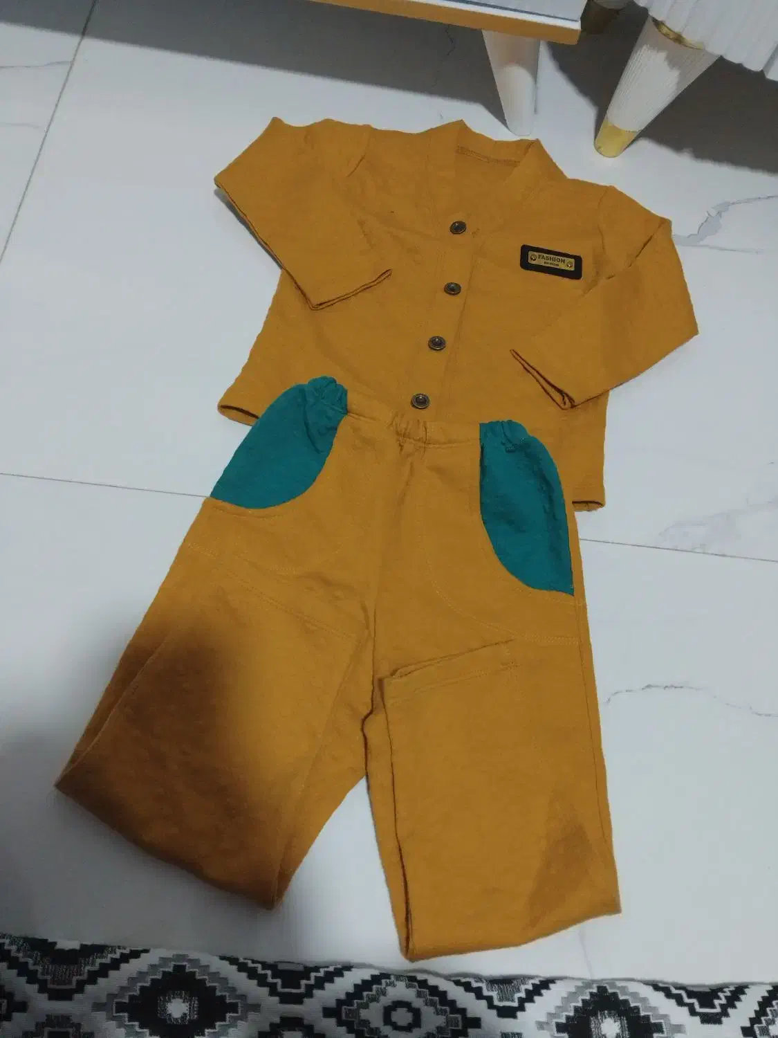 لباس پسرونه|کفش و لباس بچه|رشت, حومه رشت|دیوار