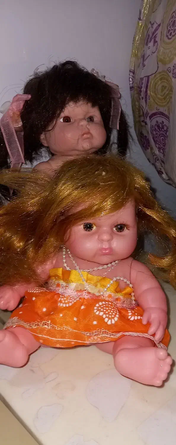 عروسک|اسباب‌بازی بچه|قم, باغ شریفی|دیوار