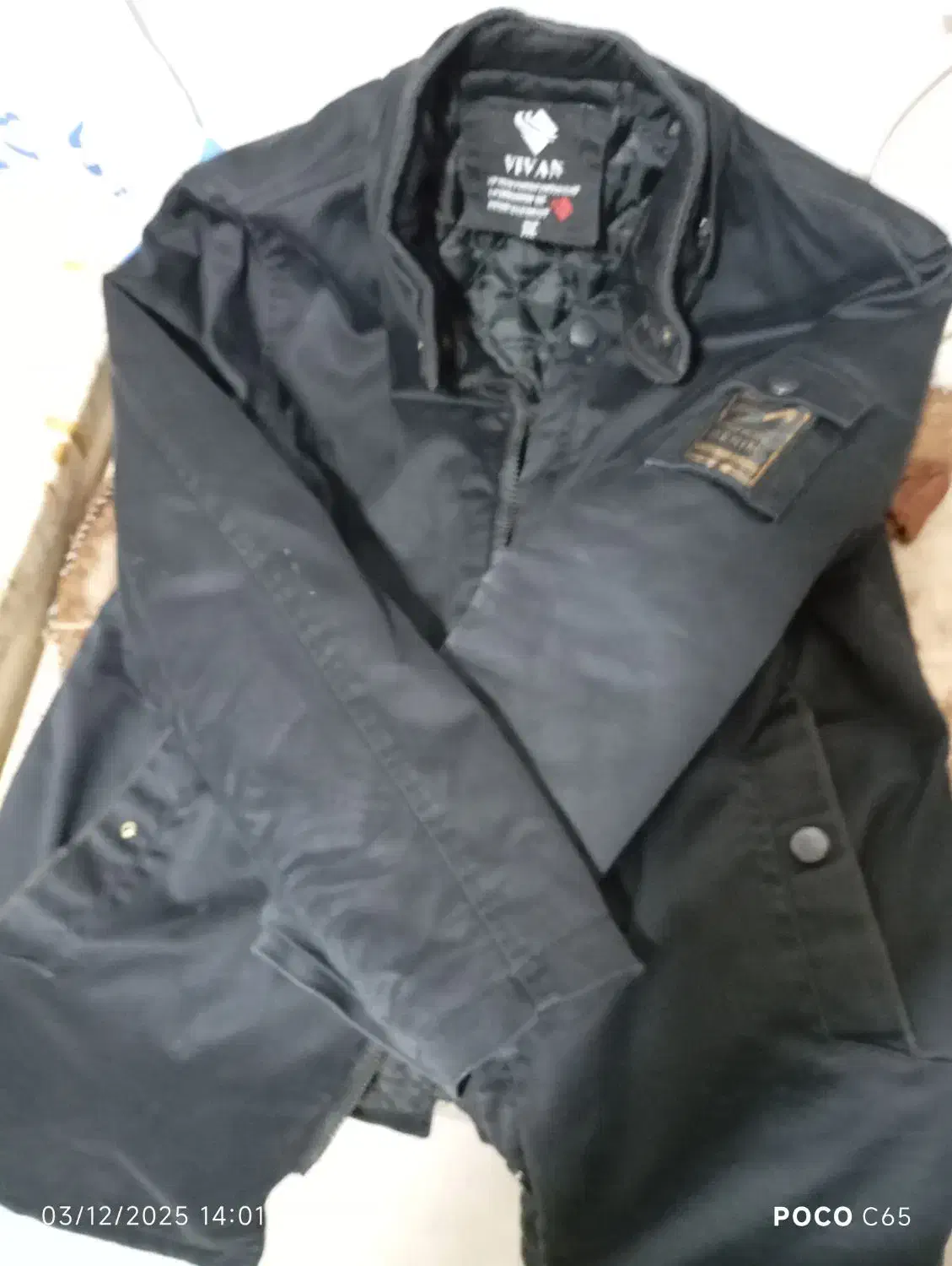 کاپشن|لباس|قم, قلعه عموحسین|دیوار