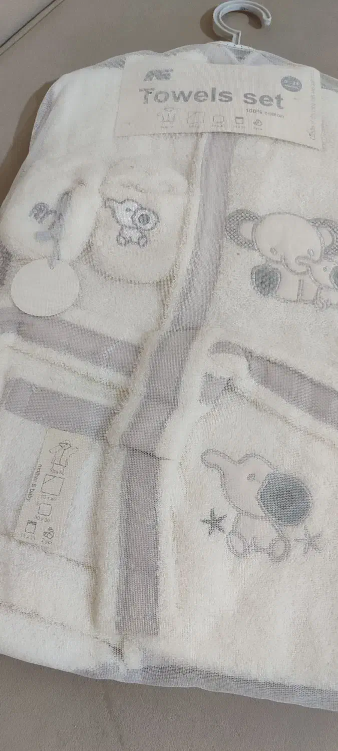 حوله تنپوش نوزادی|کفش و لباس بچه|اندیشه, اندیشه فاز ۲|دیوار