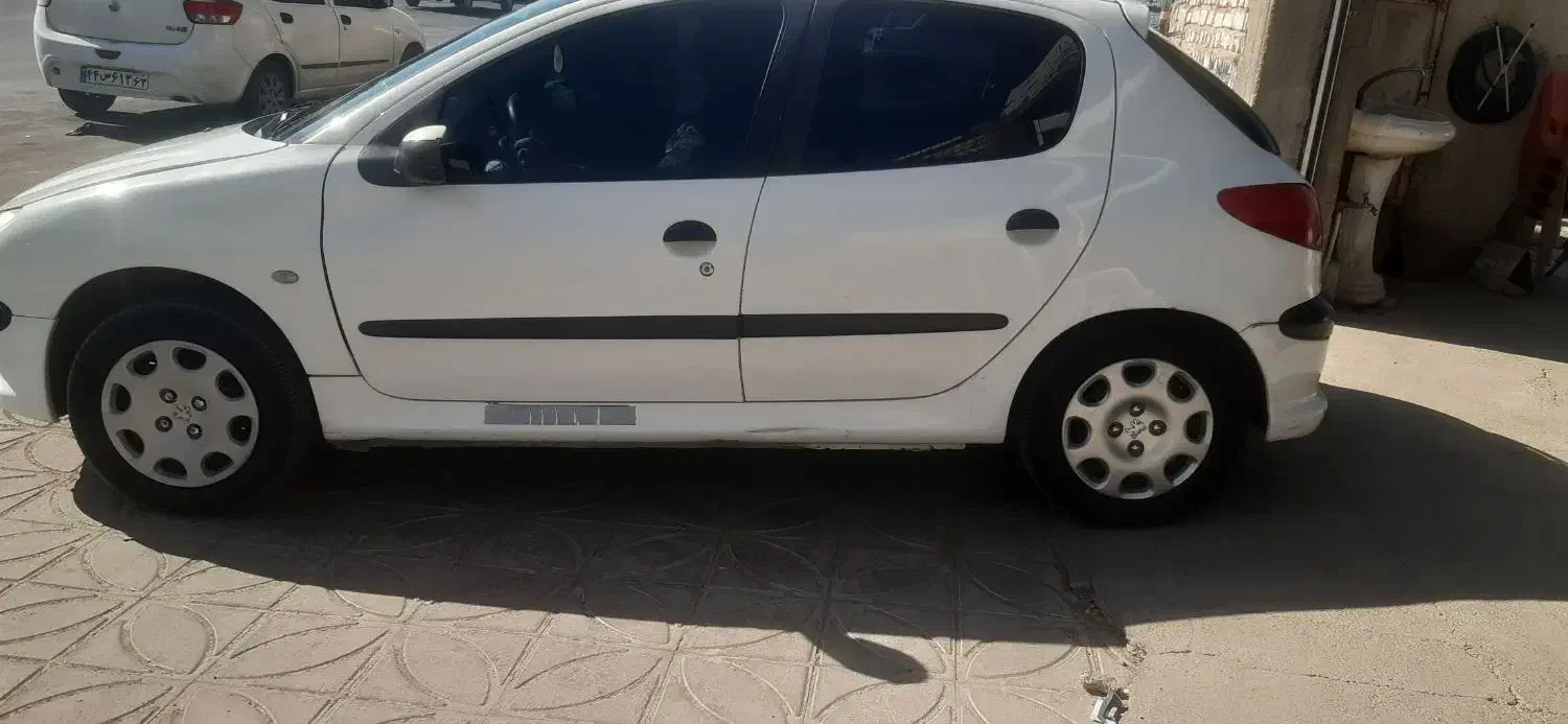 پژو ۲۰۶ سفید ۸۹ تیپ ۲|خودرو سواری و وانت|مرودشت, ژیان|دیوار