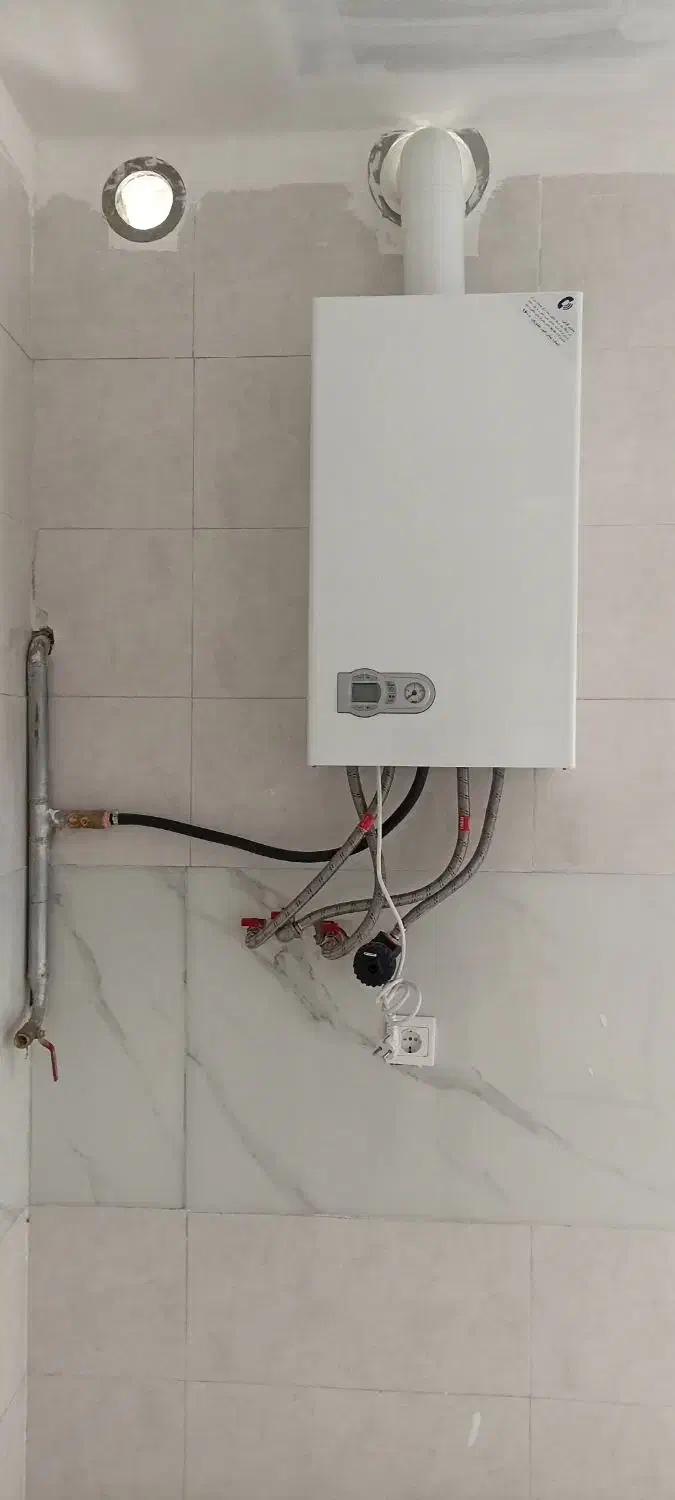 تعمیرپکیج ابگرمکن رادیاتو لوله کشی|خدمات پیشه و مهارت|اردبیل, |دیوار