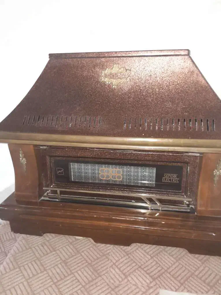 بخاری طرح شومینه پایه چوبی|بخاری، هیتر، شومینه|فردیس, شهرک راه آهن|دیوار