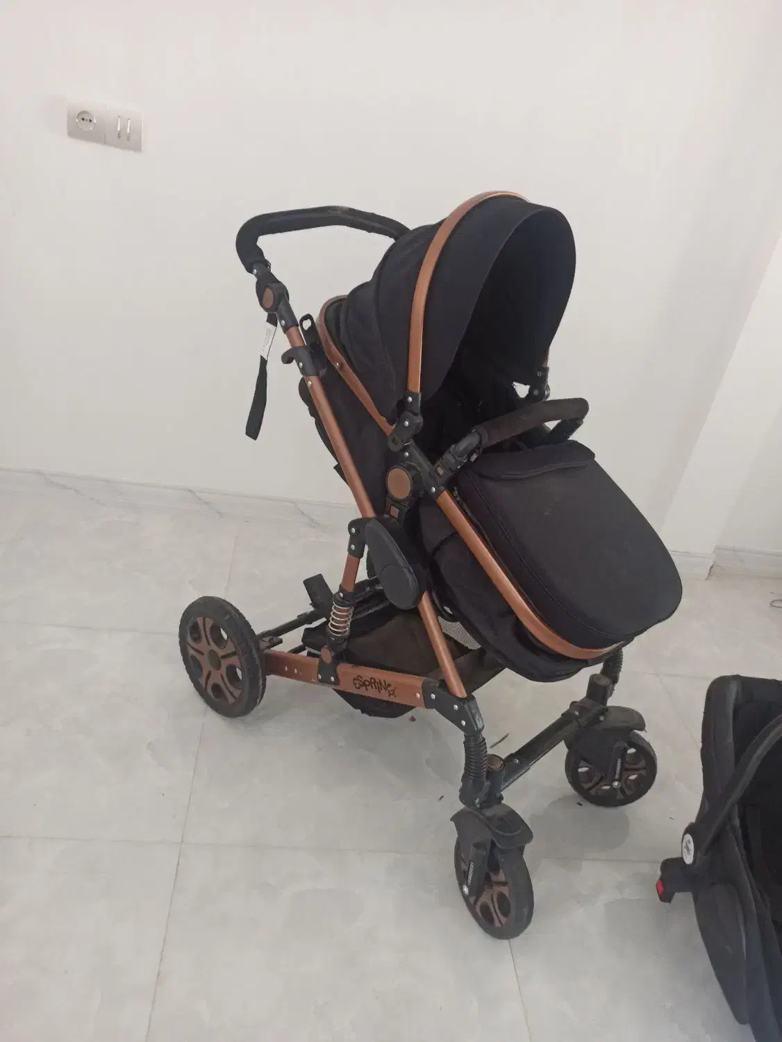 کالسکه وکریر اسپرینگ مدل اسپیدا بدنه برنز رنگ مشکی|کالسکه و لوازم جانبی|کرج, ترمینال کلانتری|دیوار