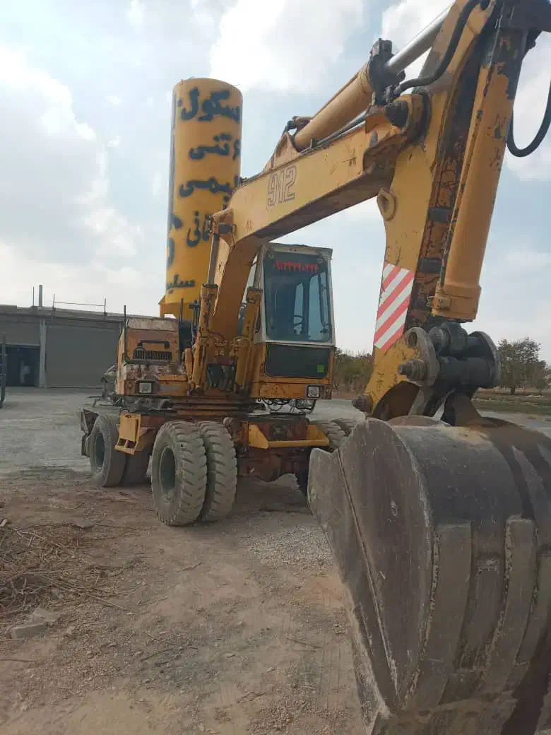 بیل مکانیکی چرخ لاستیکی|خودرو سنگین|تیران, |دیوار