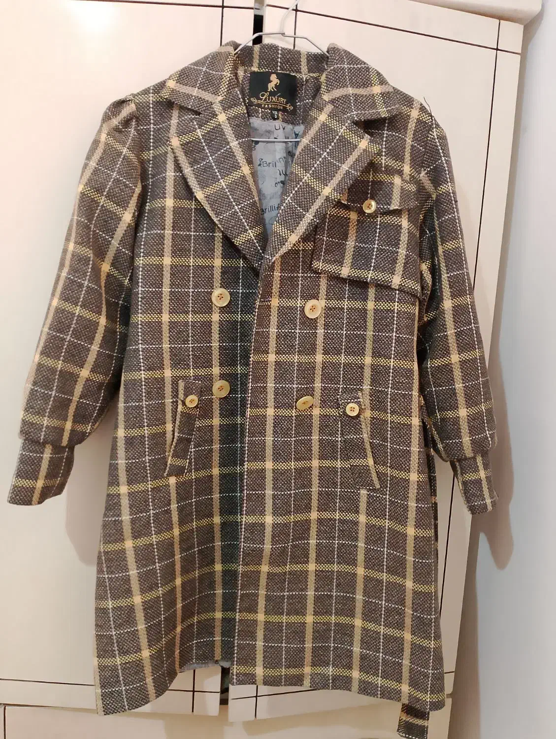 پالتو|لباس|نیشابور, فضل|دیوار