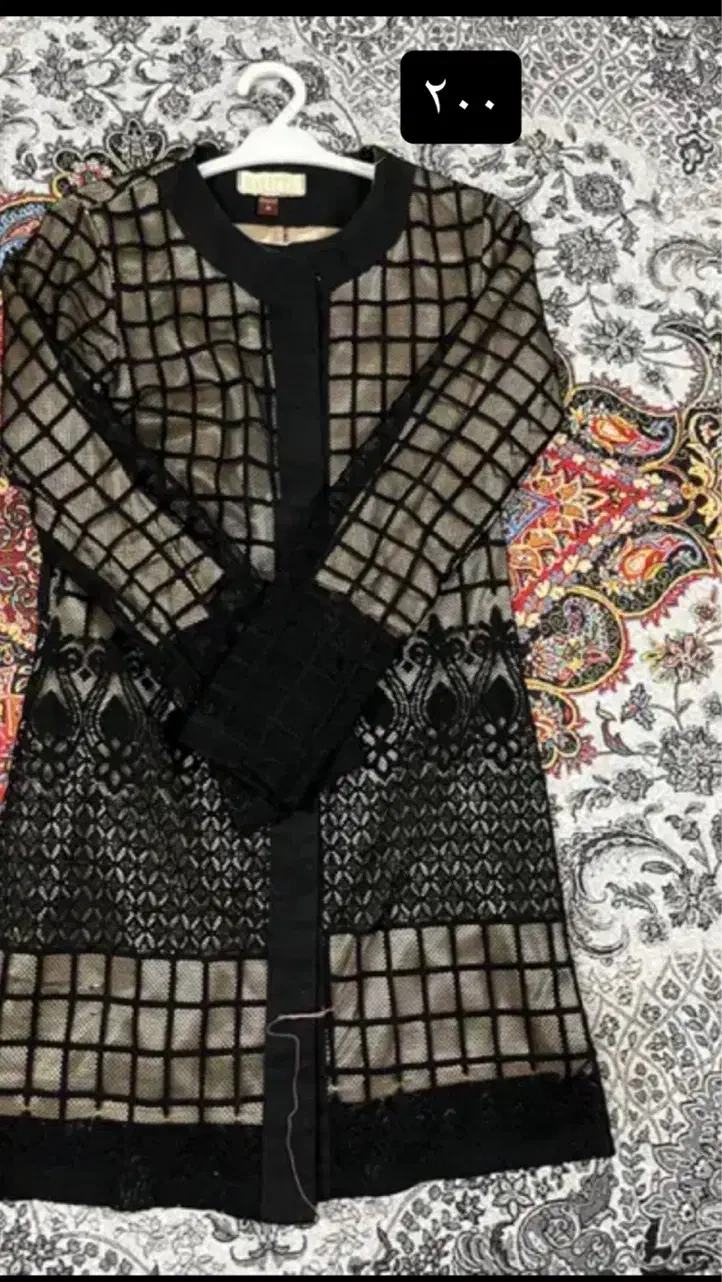 مانتو|لباس|مشهد, مصلی (کارمندان اول)|دیوار