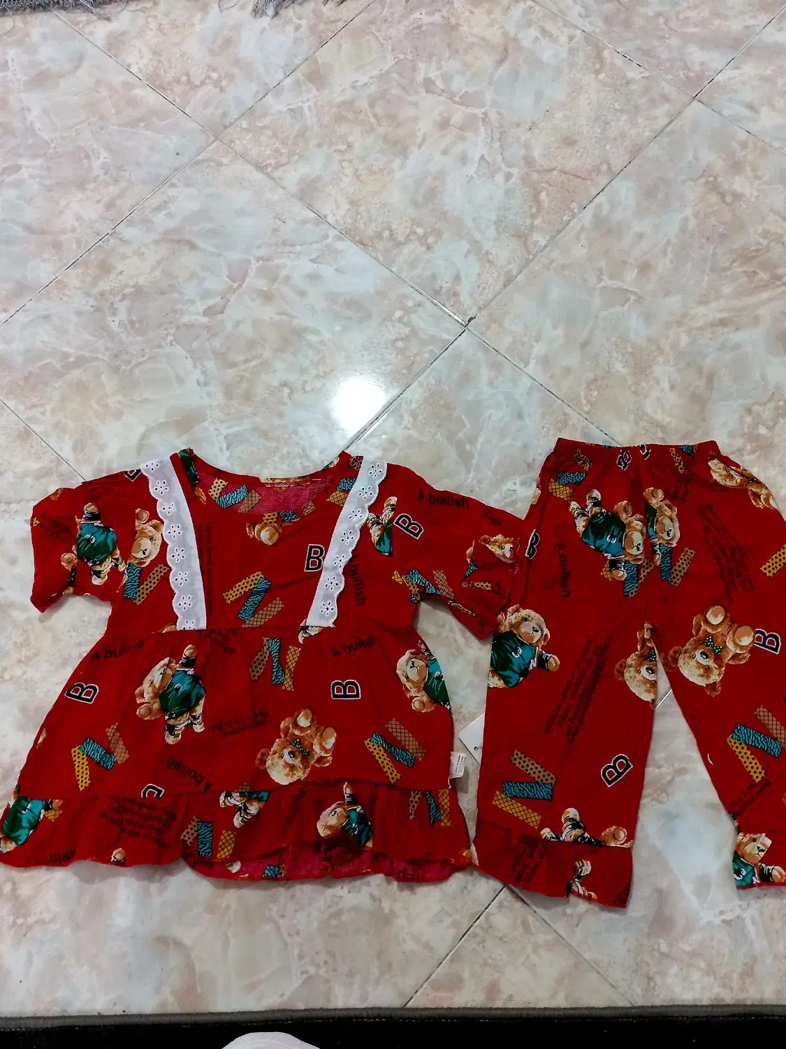 دو تیکه بچه گانه|کفش و لباس بچه|قشم, |دیوار