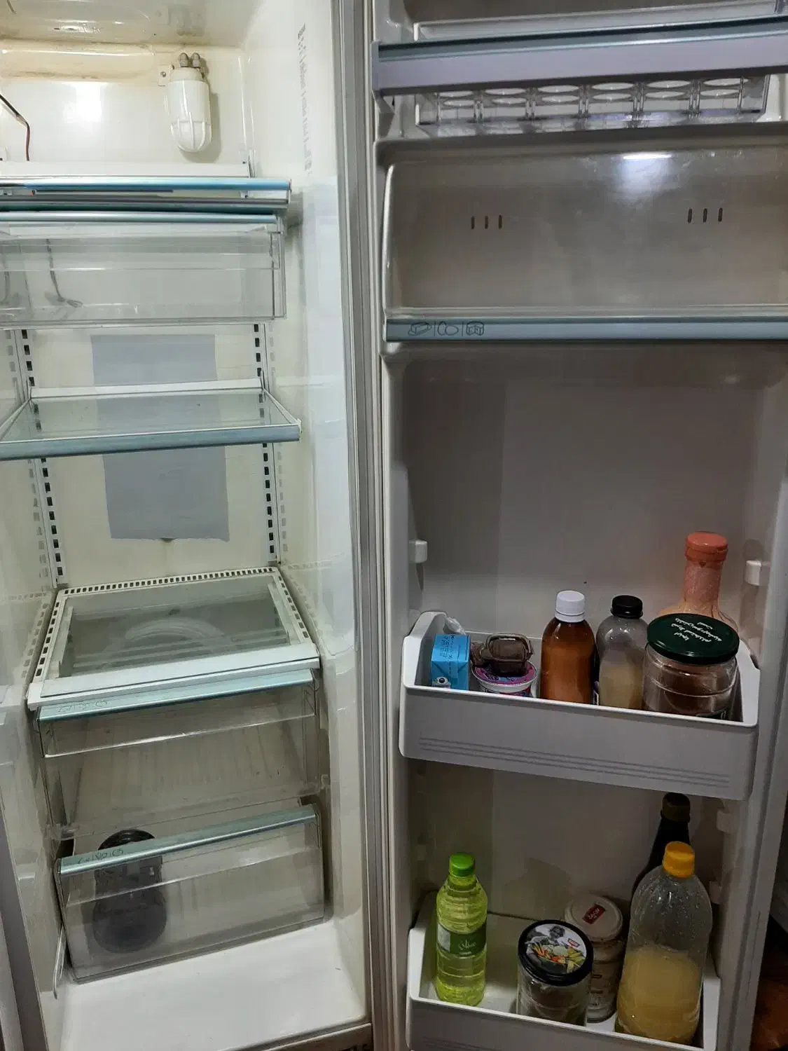 یخچال فریزر ساید کار میکند یک مشکل کوچیک داره|یخچال و فریزر|بروجرد, |دیوار