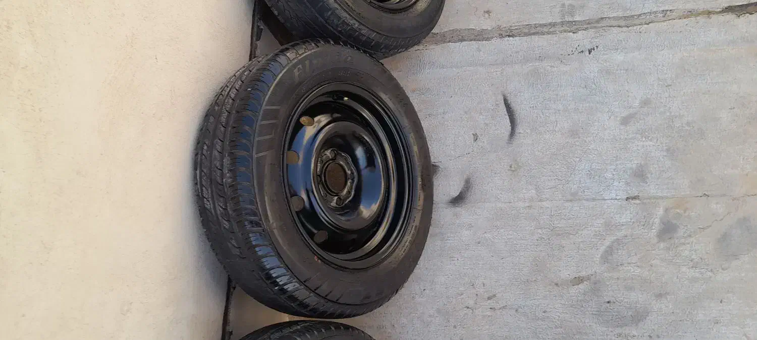 رینگ دانلوپ اصلی با لاستیک ۵ حلقه معاوضه با گوشی|قطعات یدکی و لوازم جانبی|تهران, وردآورد|دیوار