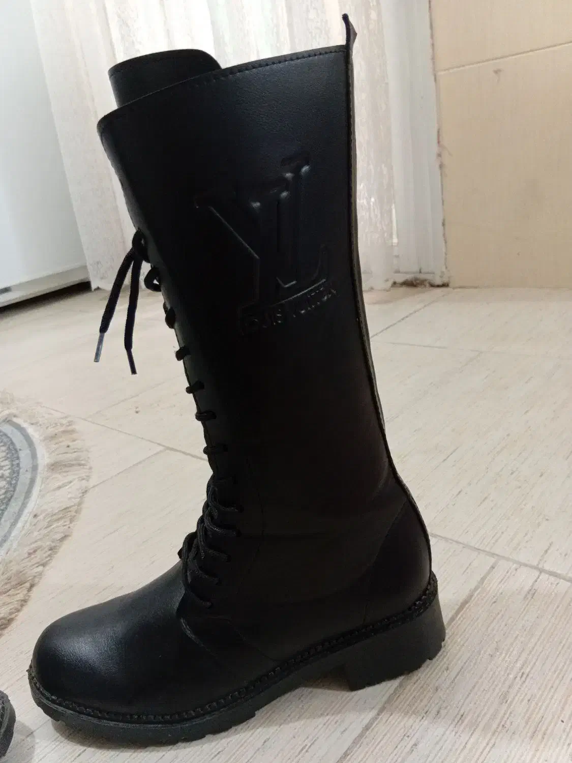 پوتین|کیف، کفش، کمربند|گرگان, |دیوار