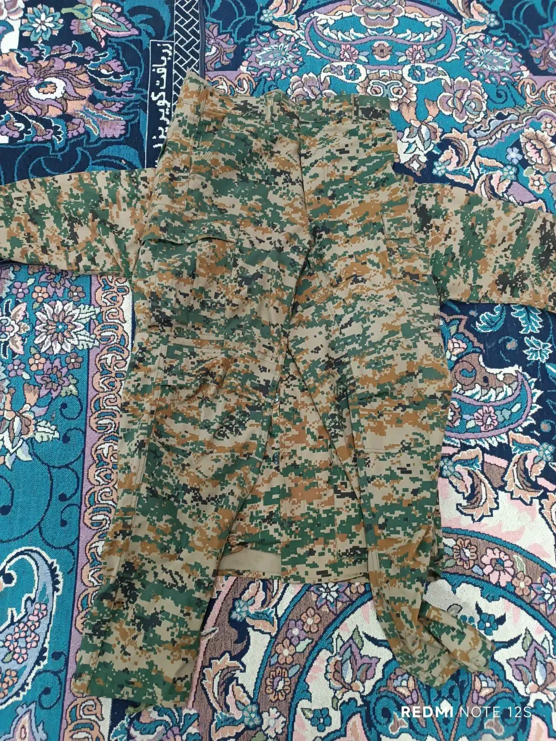 لباس نظامی|لباس|اهواز, کوی جواهری|دیوار