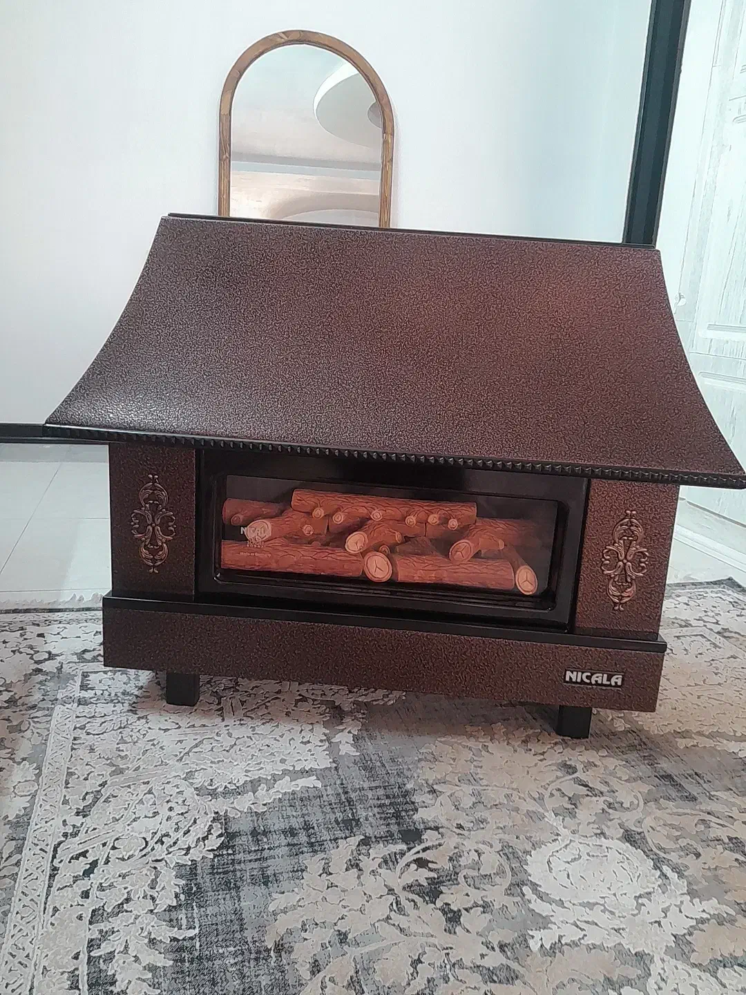 بخاری شومینه نیک کالا۲۸۰۰۰|بخاری، هیتر، شومینه|شیروان (خراسان), |دیوار