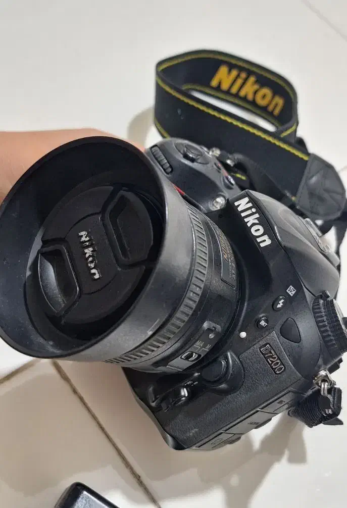 نیکون d7200 با لنز نیکور 35mm / f1/8|دوربین عکاسی و فیلم‌برداری|تهران, فلسطین (میدان انقلاب)|دیوار