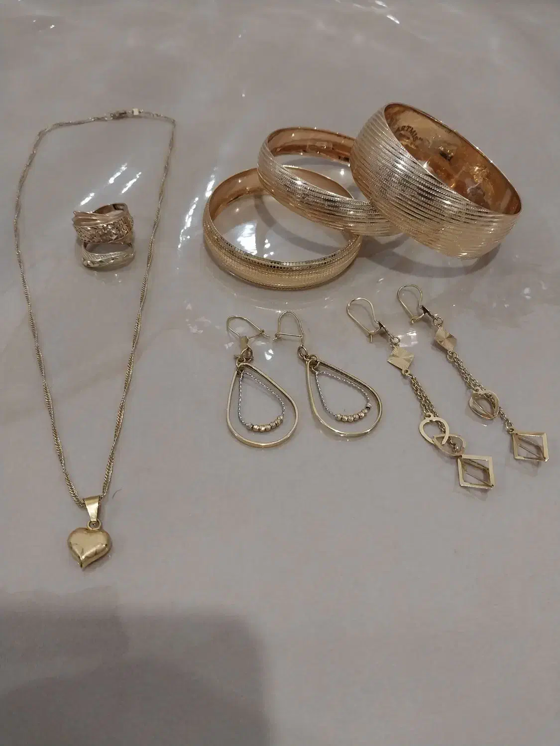 گوشواره و تکپوش و انگشتر و گردنبند طلا|جواهرات|مسجد سلیمان, |دیوار