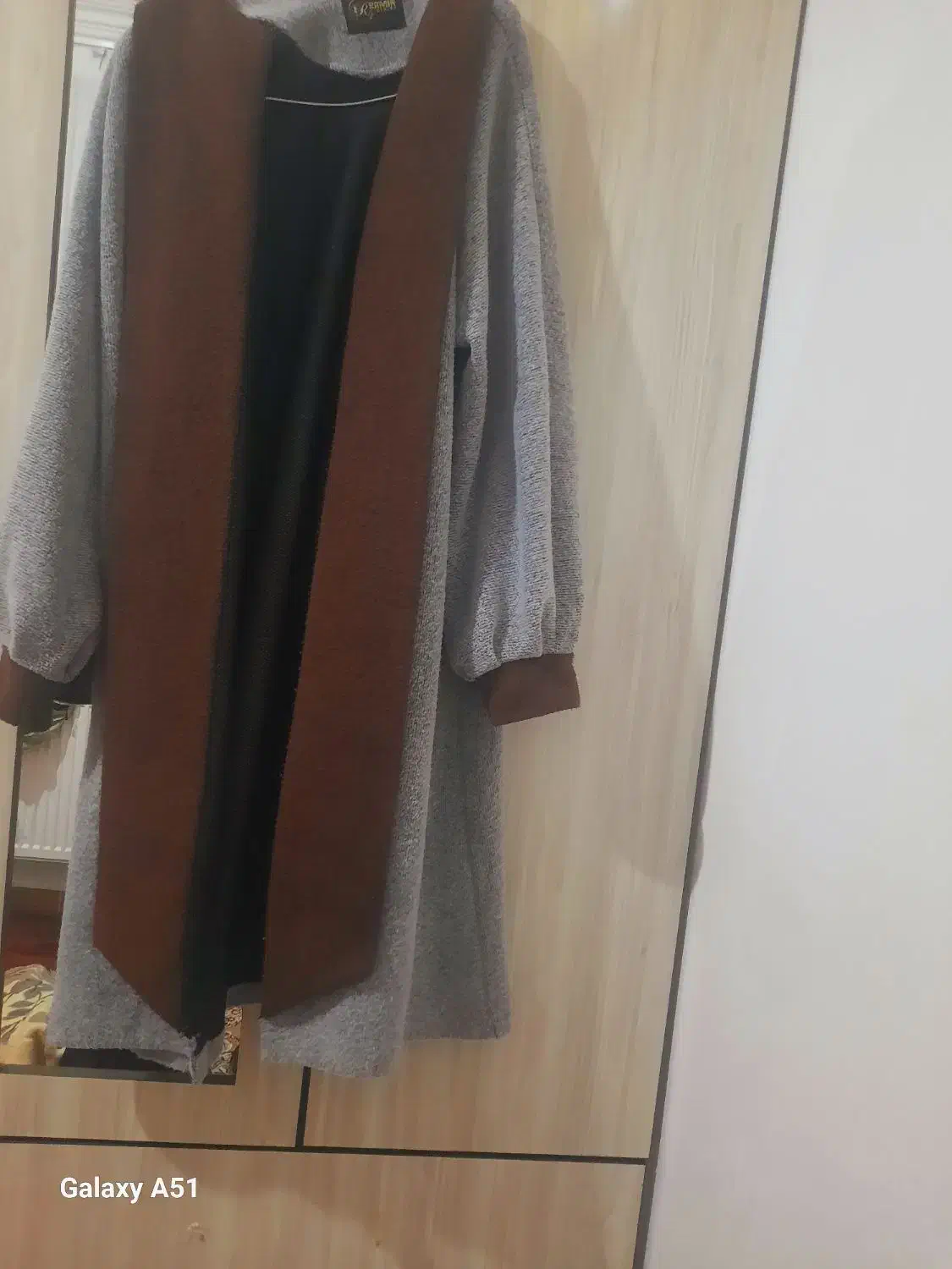 دوعدد پالتوی کوتاه و بلند|لباس|نمین, |دیوار