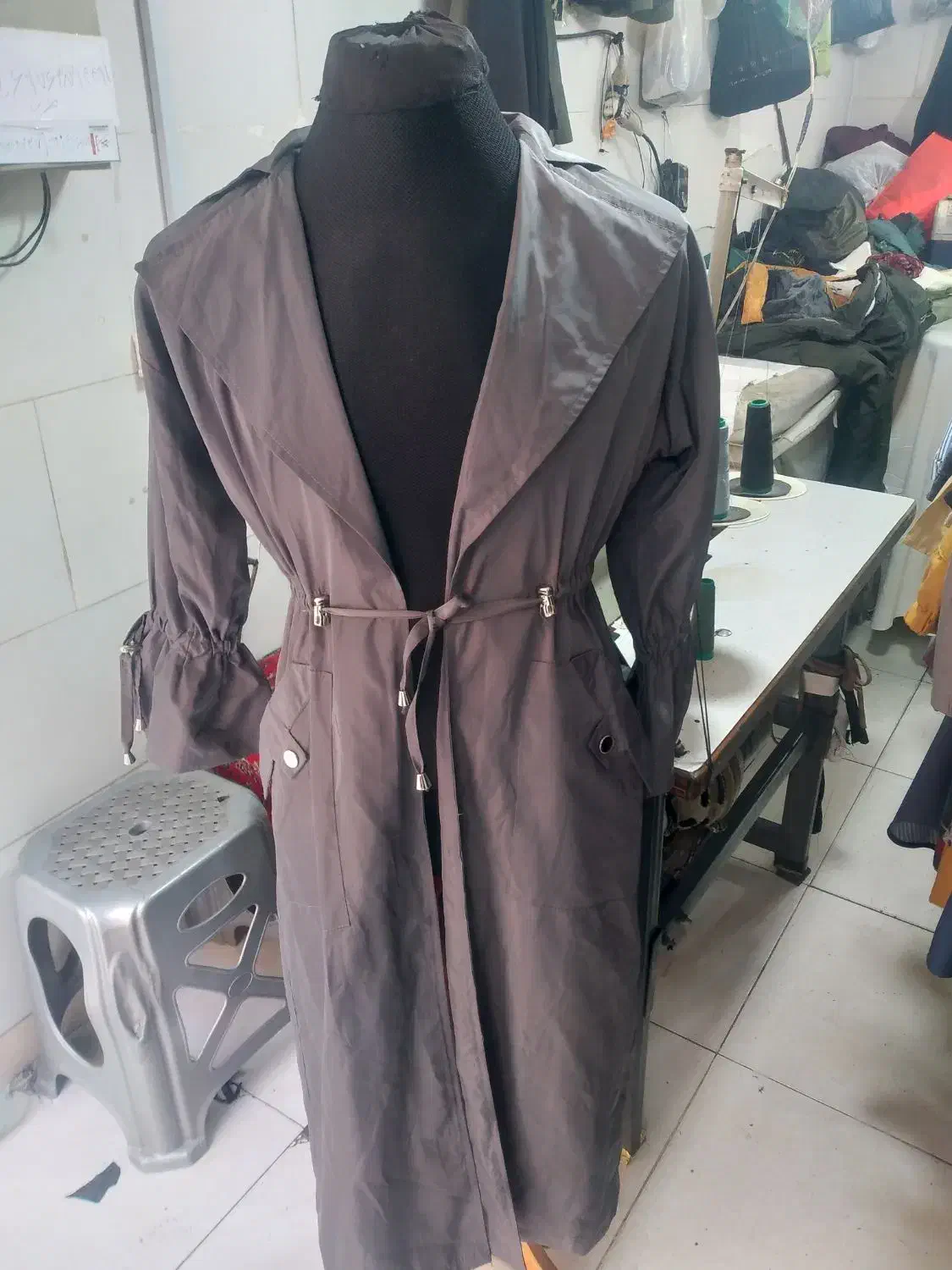 پالتو وبارانی|لباس|قدس, شهرقدس|دیوار