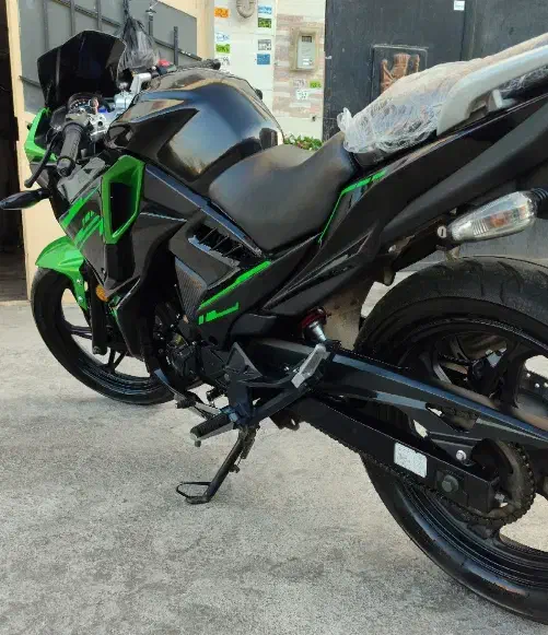 مگلی|موتورسیکلت|رشت, پل تالشان|دیوار