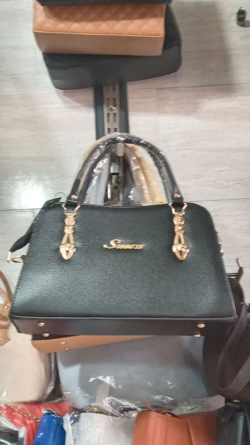 کیف مجلسی|کیف، کفش، کمربند|آستانه اشرفیه, |دیوار