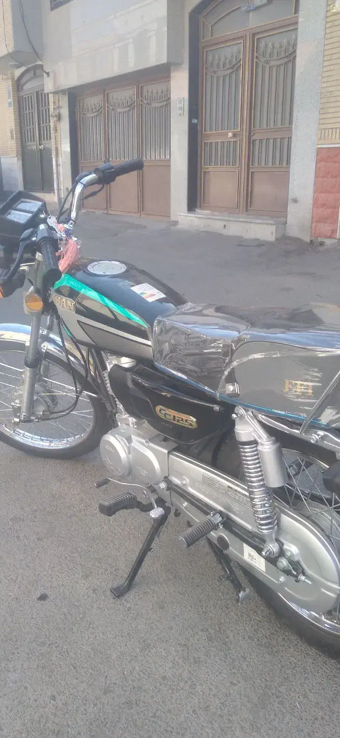 موتورسیکلت احسان|موتورسیکلت|قم, چهل درخت‎|دیوار