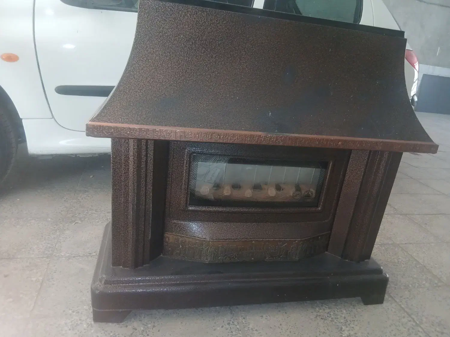 بخاری طرح شومینه|بخاری، هیتر، شومینه|مهاجران, |دیوار