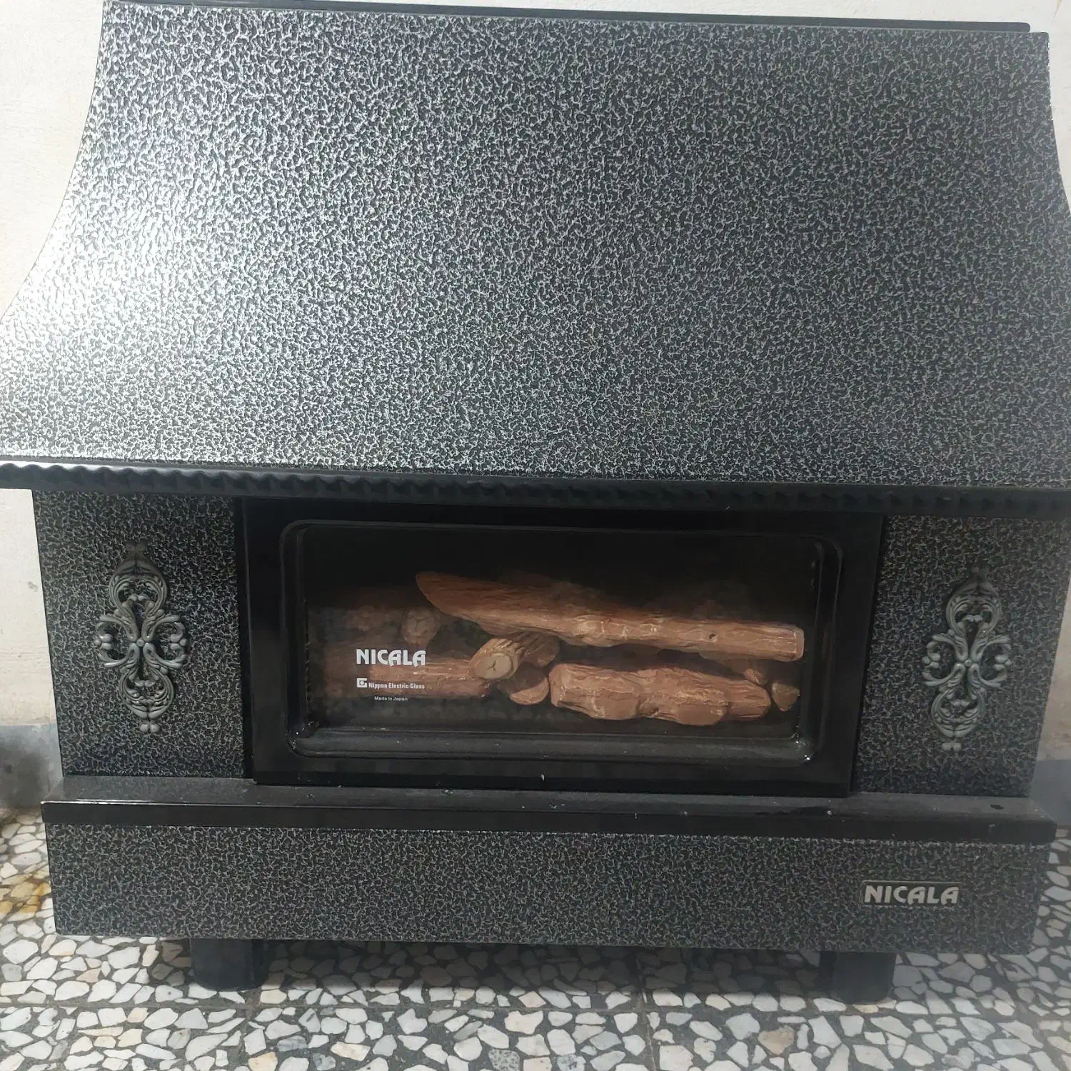 بخاری طرح شومینه ۱۸ هزار نیک کالا در حد نو|بخاری، هیتر، شومینه|صومعه‌سرا, |دیوار