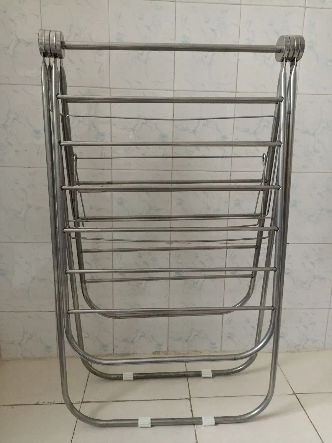 بند رخت لباس|بندرخت و رخت‌آویز|رشت, پل تالشان|دیوار
