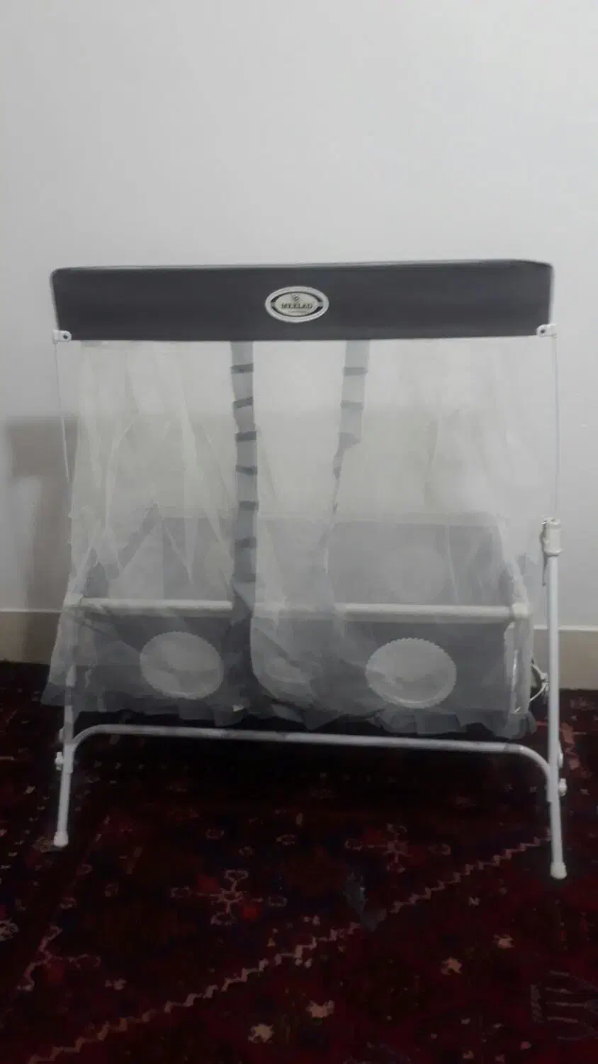 گهواره میلاد|کالسکه و لوازم جانبی|قم, نیروگاه|دیوار