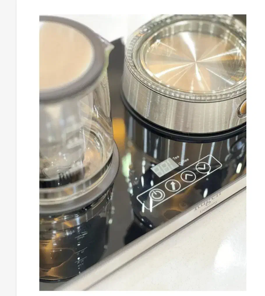 چای ساز کنار همی روگن آلمان|سماور، چای‌ساز، قهوه‌ساز|مهاجران, |دیوار