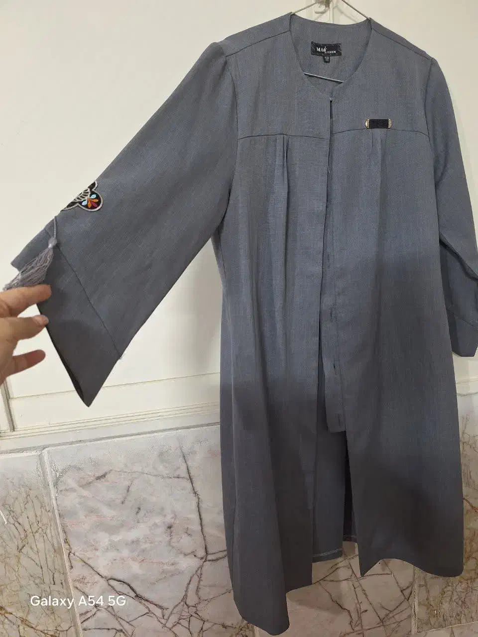 مانتو|لباس|مشهد, کارگران|دیوار