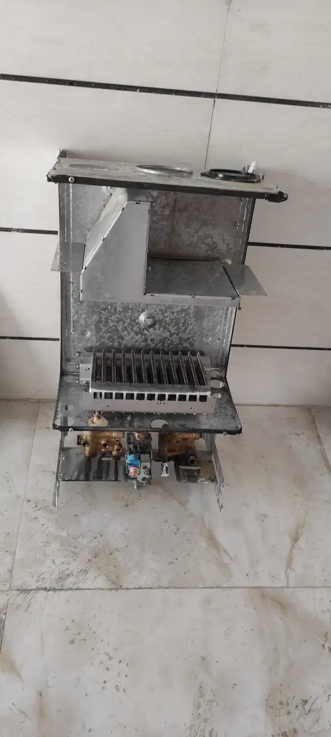 تعمیر تضمینی انواع پکیج و آبگرمکن دیواری ورادیاتور|خدمات پیشه و مهارت|همدان, |دیوار