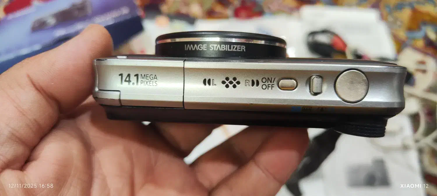 دوربین دیجیتال کنون ۱۴ مگاپیکسلی|دوربین عکاسی و فیلم‌برداری|اندیشه, اندیشه فاز ۴|دیوار