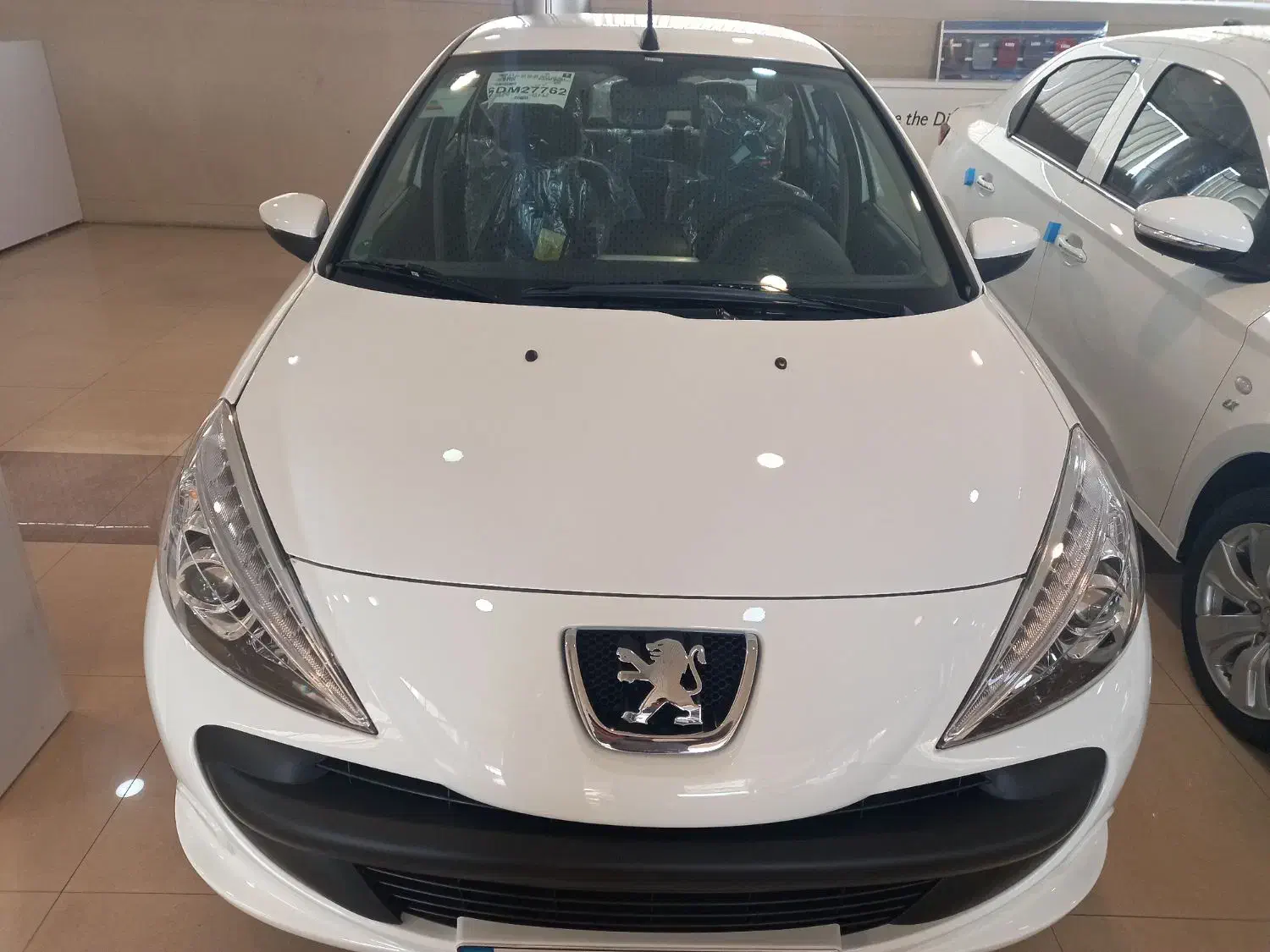 ۲۰۷ تیوفایو  ارتقاع یافته صفر خشک|خودرو سواری و وانت|رشت, هلال احمر|دیوار