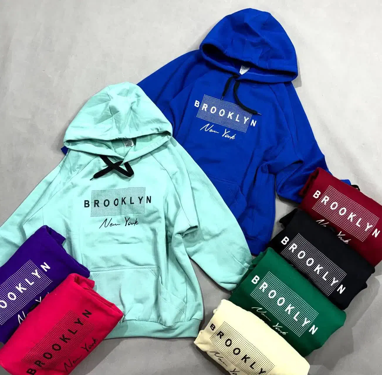 هودی آستین رگلان جیب دار|لباس|مهاجران, |دیوار