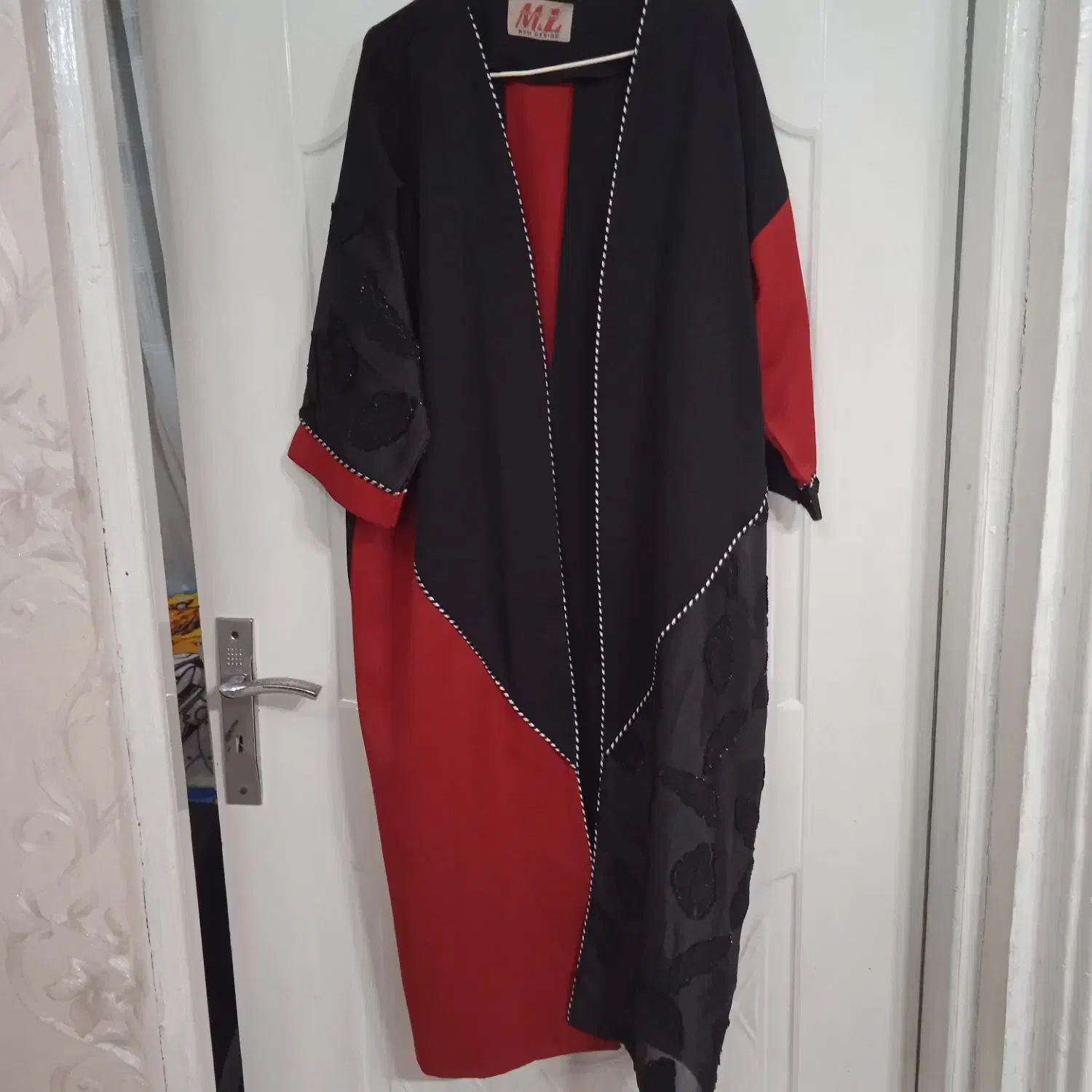 لباس و مانتو|لباس|صومعه‌سرا, |دیوار