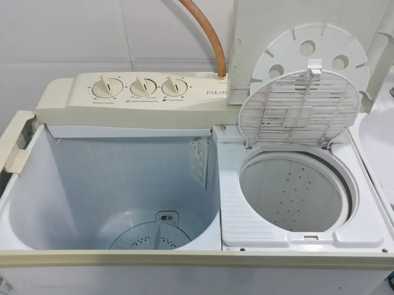 ماشین لبایشویی دوقلو پاکشوما|ماشین لباسشویی و خشک‌کن لباس|کنارک, |دیوار