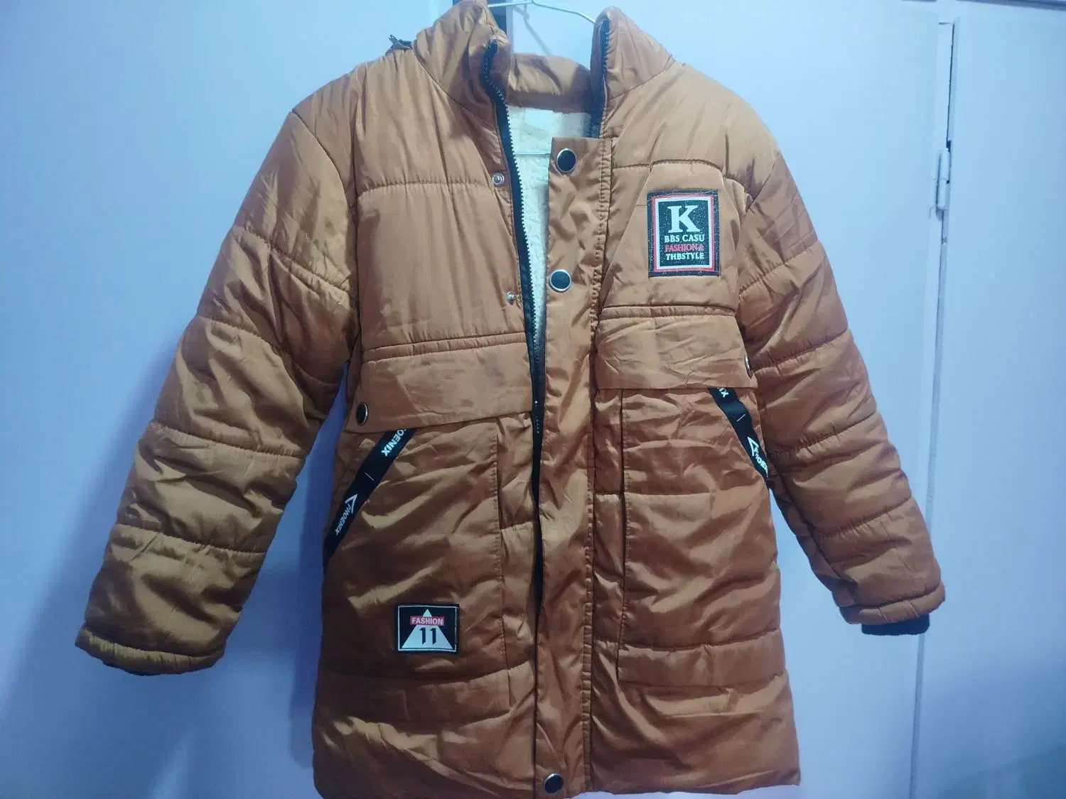 کاپشن  نو|لباس|اهواز, سپیدار|دیوار