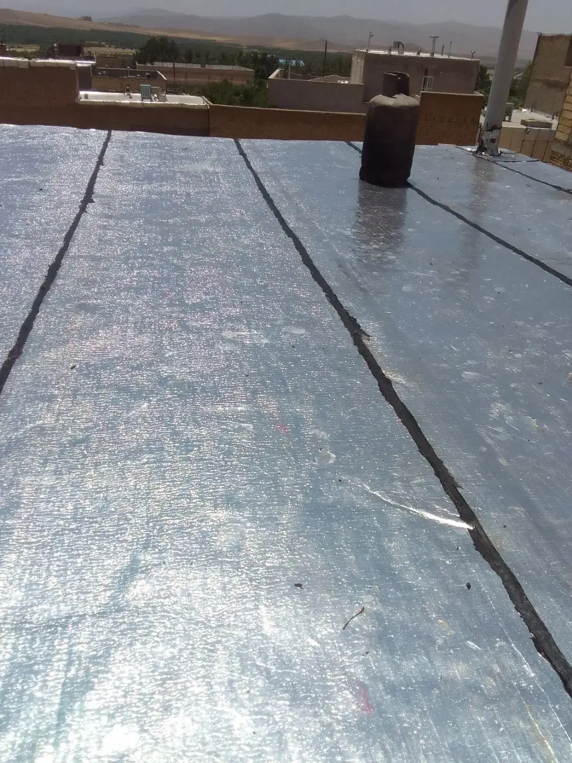 نصب و لکه گیری ایزوگام و قیر گونی|خدمات پیشه و مهارت|ملایر, |دیوار