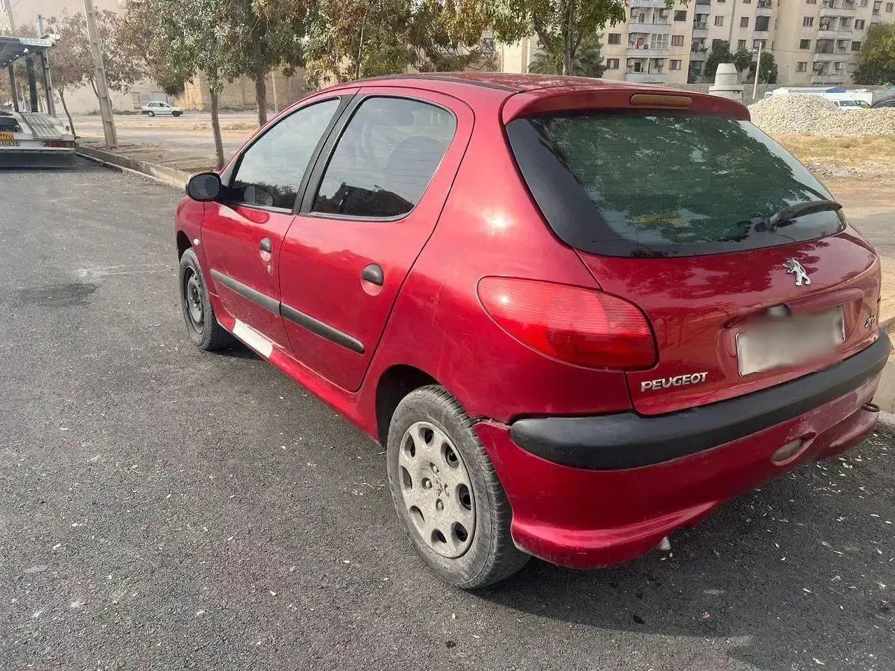 206 آلبالویی مدل 90|خودرو سواری و وانت|شیراز, قالیشویی|دیوار