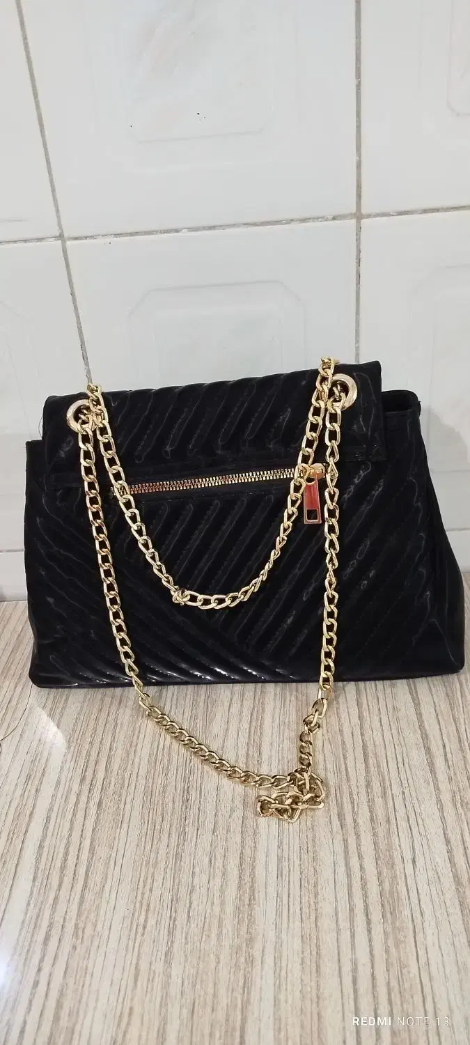 کیف|کیف، کفش، کمربند|قروه, |دیوار