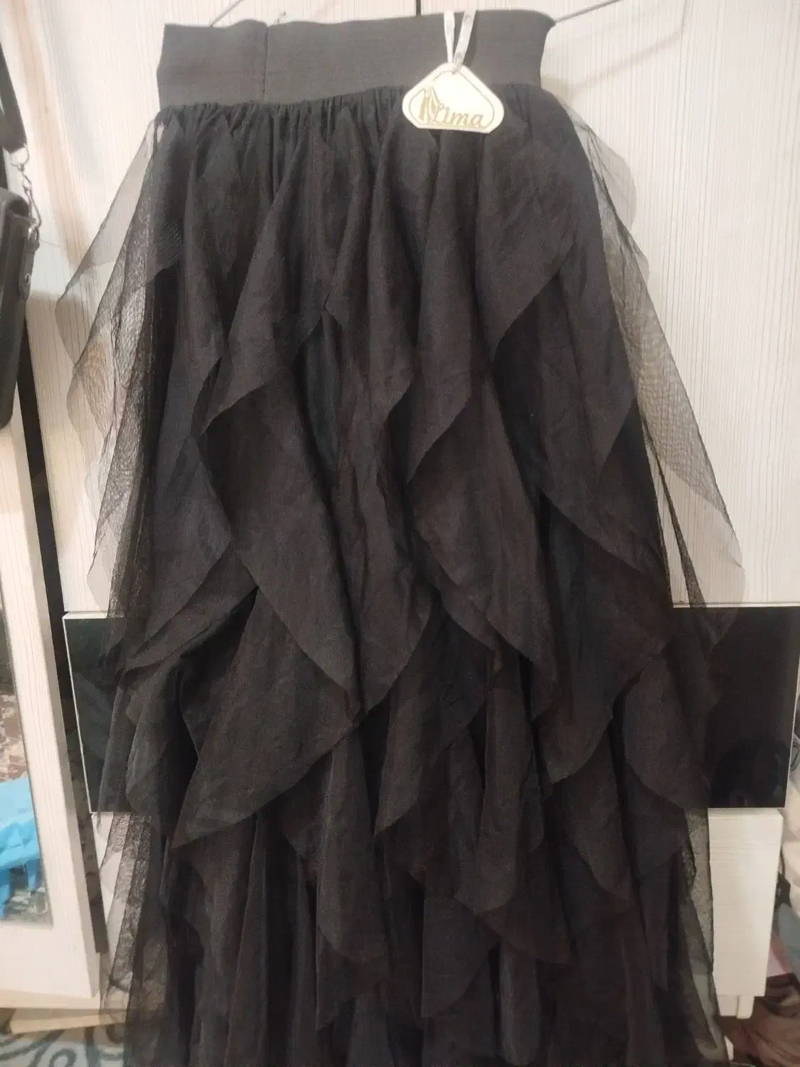 دامن مجلسی|لباس|رباط‌کریم, رباط‌کریم|دیوار