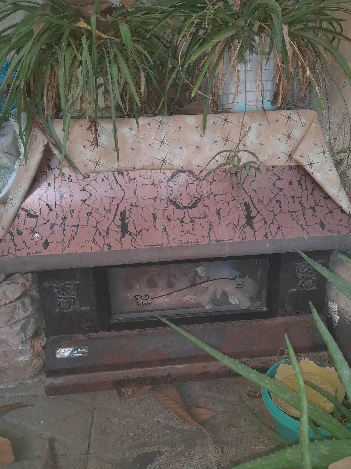 بخاری شومینه ای .|بخاری، هیتر، شومینه|کلاله, |دیوار