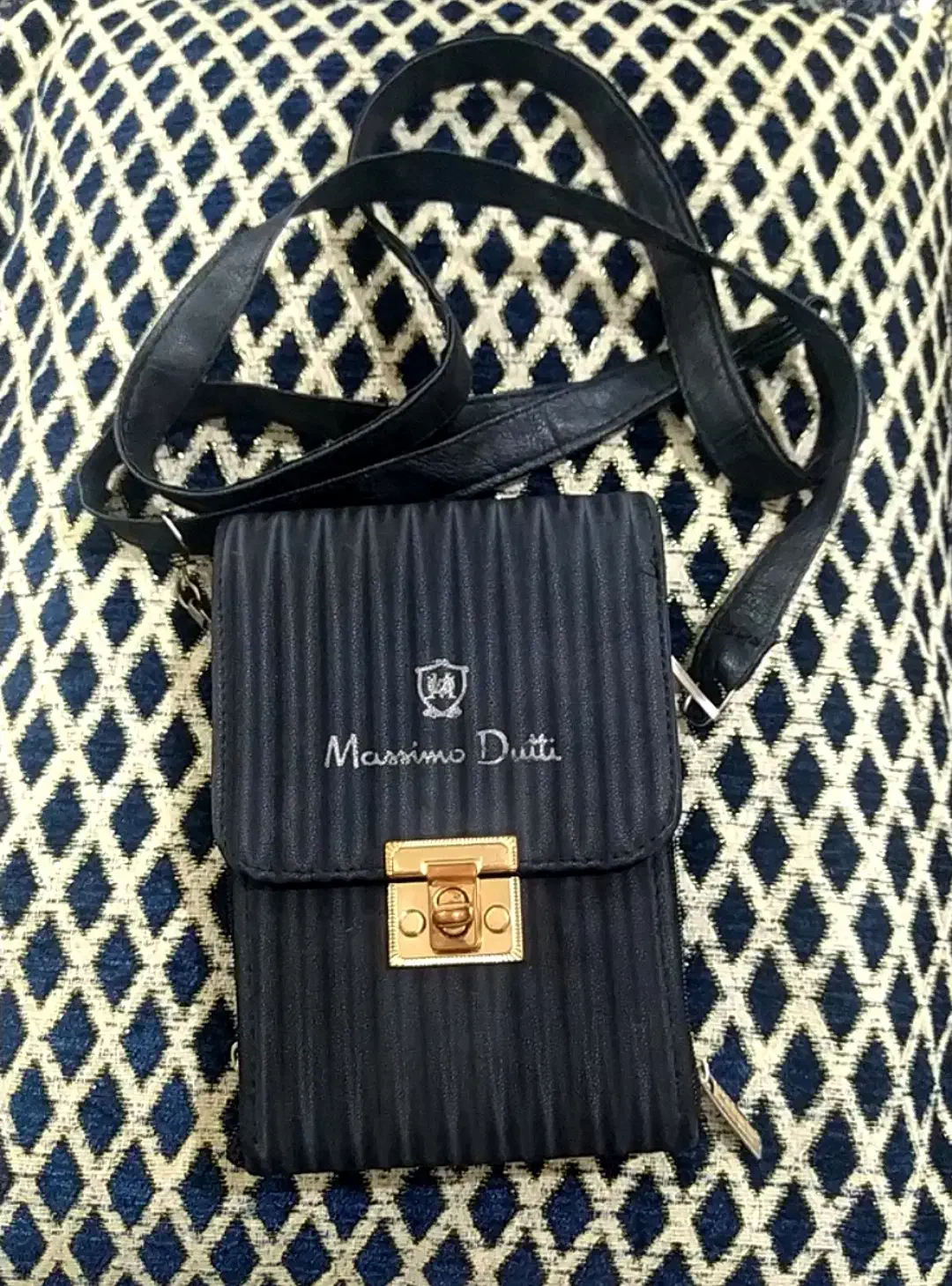 کیف|کیف، کفش، کمربند|قم, حکمت شمالی|دیوار