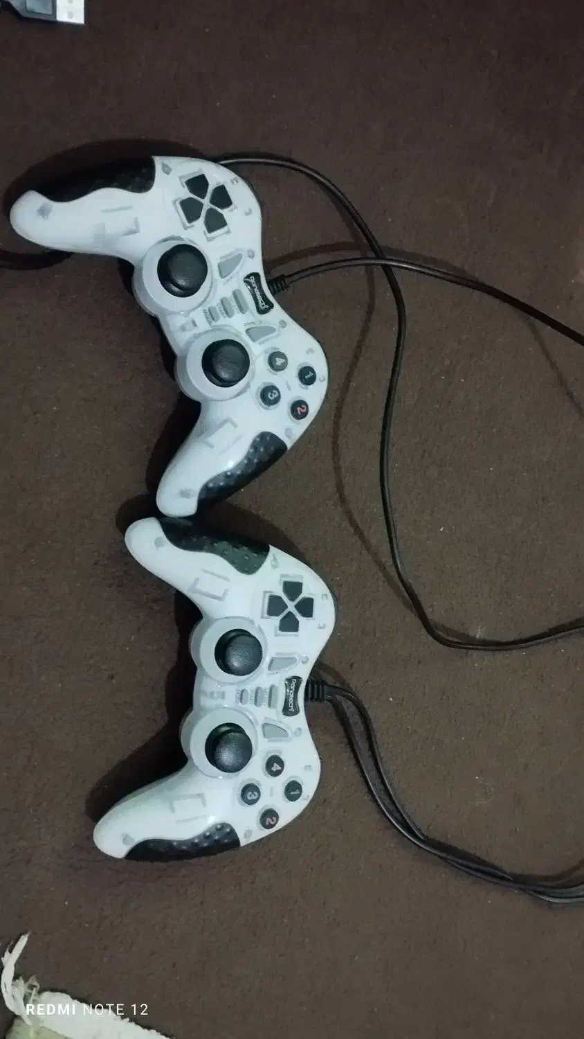 دسته کنسول بازی شوکر دار سیمی نو نو|کنسول، بازی ویدئویی و آنلاین|شیراز, بید زرد|دیوار