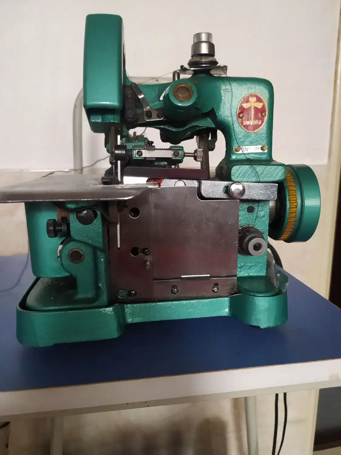 سردوز|چرخ خیاطی و ریسندگی|میانه, |دیوار