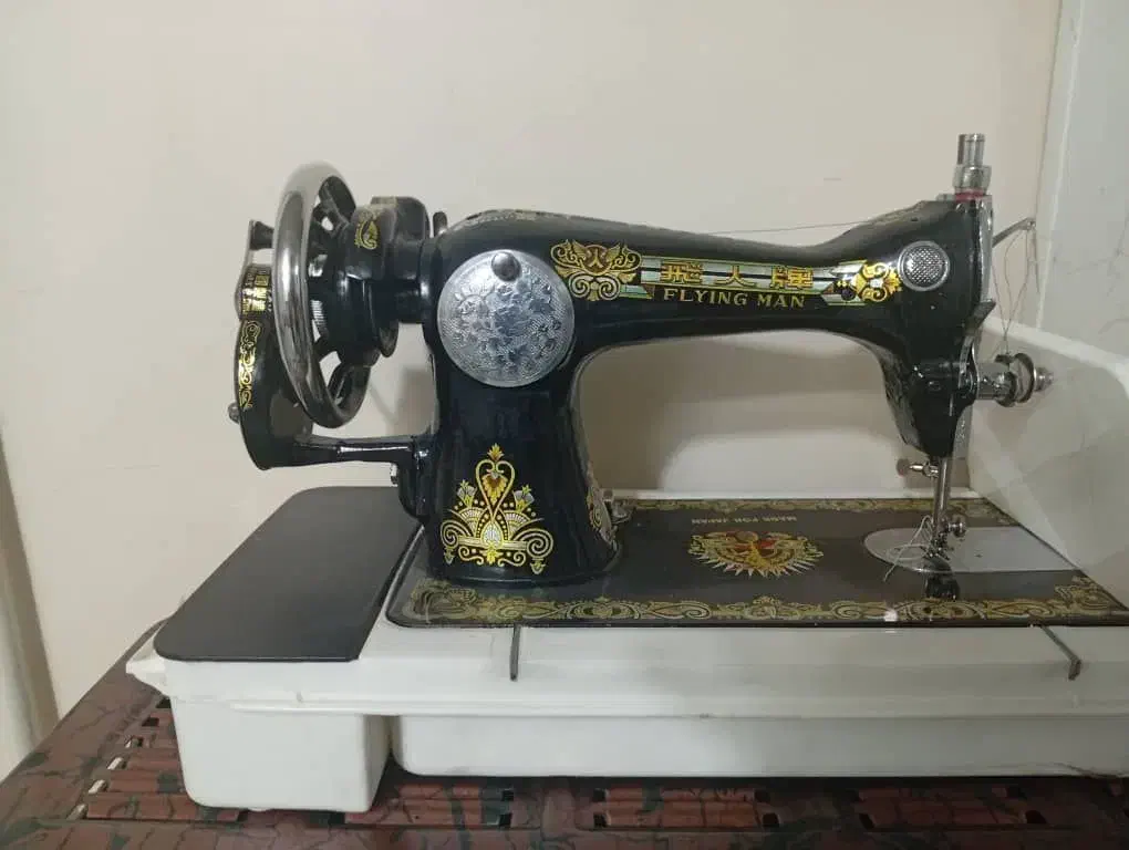 چرخ خیاطی|چرخ خیاطی و ریسندگی|ری, شهادت|دیوار