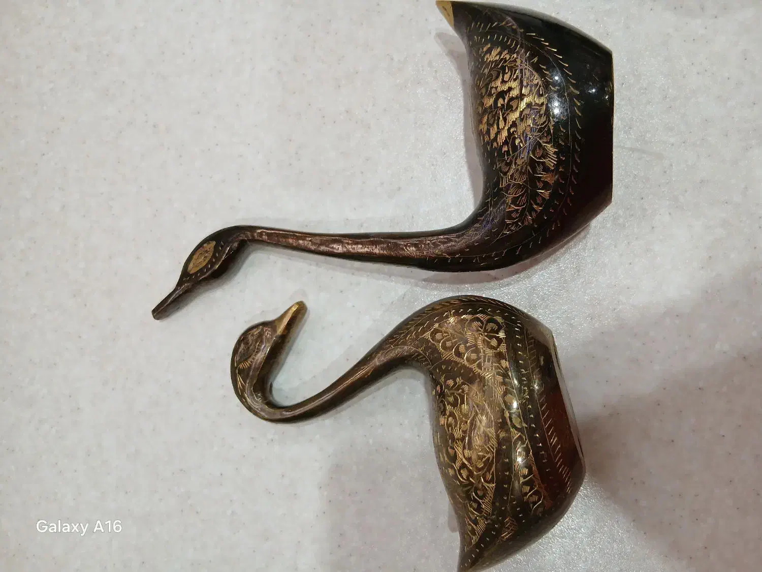 قوی عاشق برنزی|مجسمه، تندیس، ماکت|رباط‌کریم, نصیرشهر|دیوار