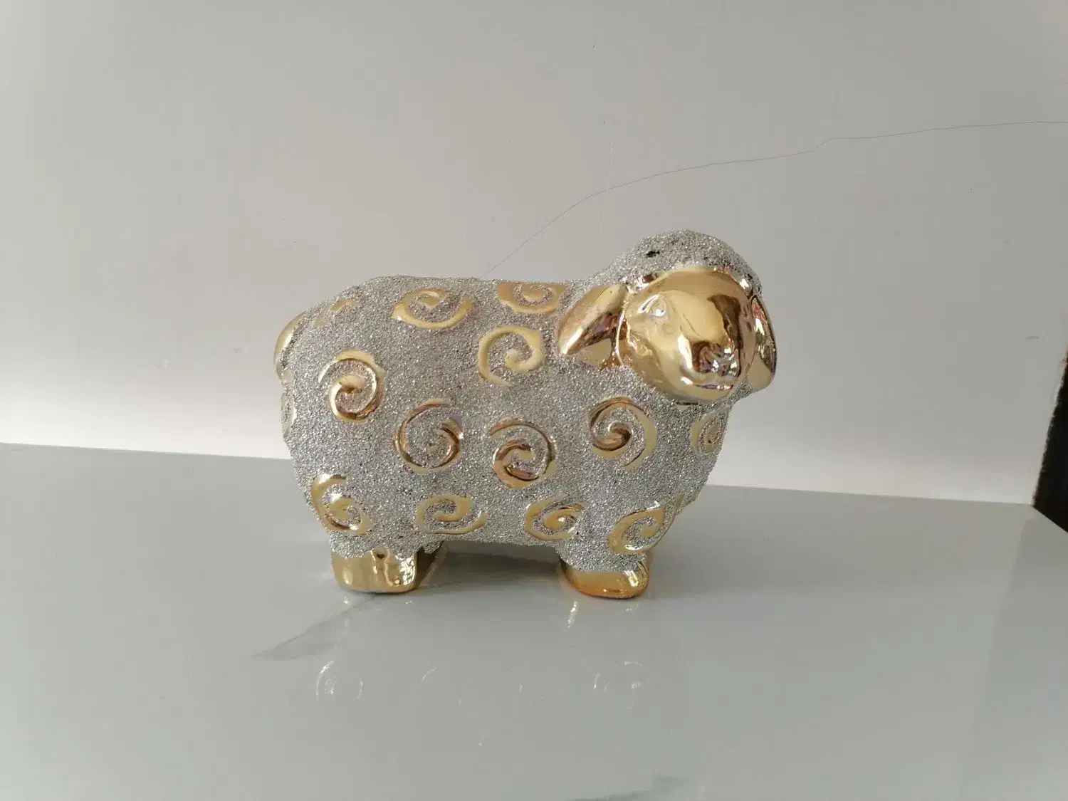 مجسمه طلایی|مجسمه، تندیس، ماکت|گرگان, |دیوار