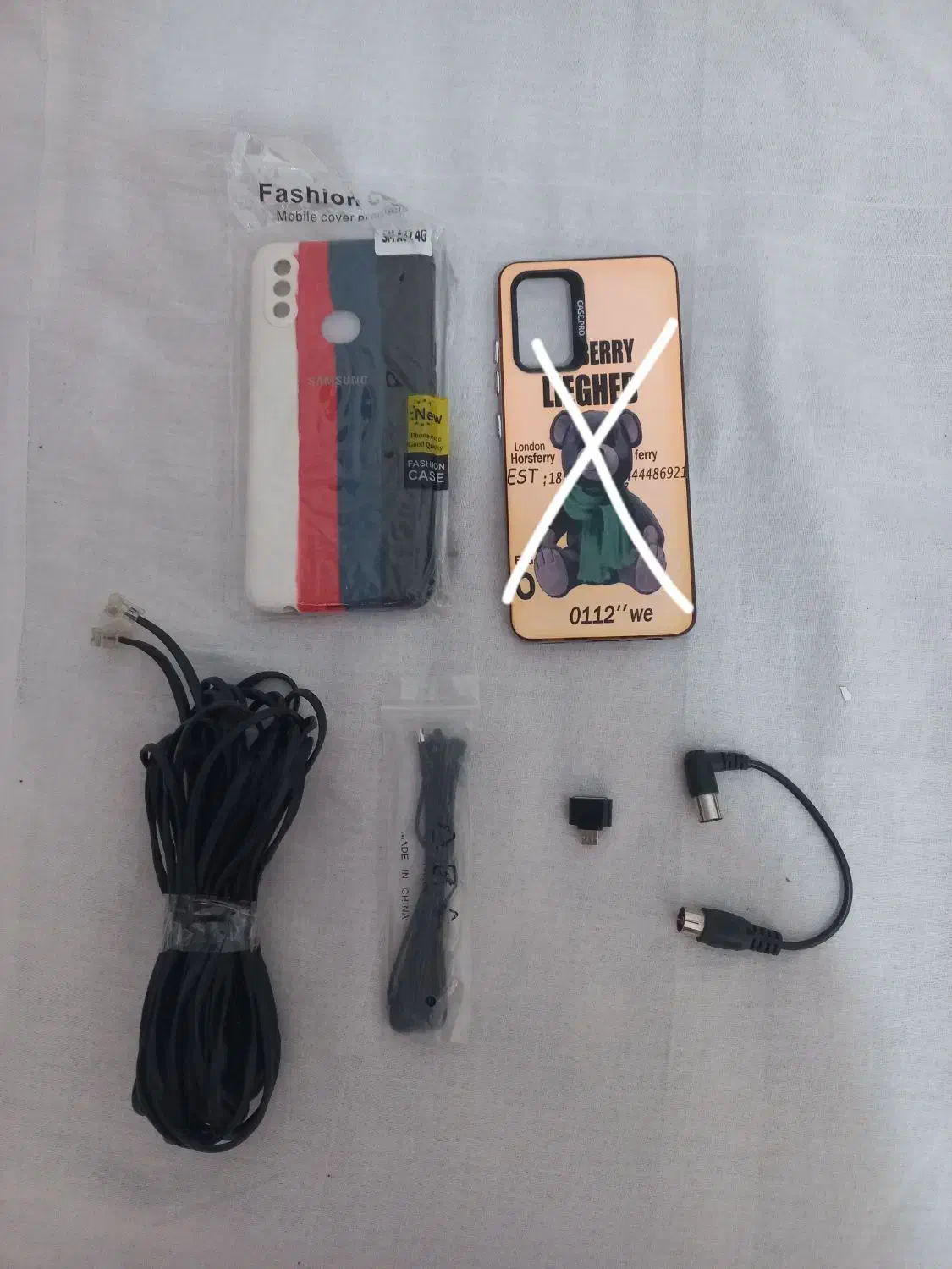 قاب گوشی A10s و OTG گوشی و سیم تلفن ۱۰ متری|لوازم جانبی موبایل و تبلت|قم, امامزاده ابراهیم|دیوار